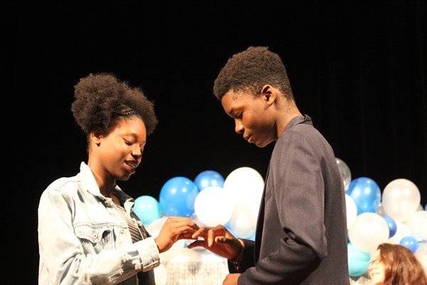 Students receive rings at the Ring Ceremony